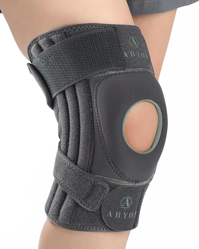 ABYON Joelheira ELITE para homem e mulher com alças antiderrapantes ajustáveis em 4 direções e estabilizadores laterais, suporte para dor no joelho, artrite, LCA, menisco, corrida e caminhada — Roupa aquecida